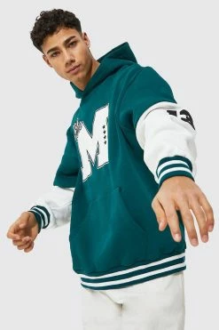 Oversized Faux Layer M Badge Hoodie