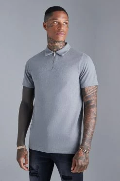 Slim Fit Jacquard Zip Polo With Man Tab